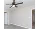Clean, minimalist bedroom design with a ceiling fan, neutral walls, and wood-look flooring at 426 Williamson St, Rock Hill, SC 29730