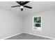 Inviting bedroom features wood-look floors, a ceiling fan, and a window with natural light at 426 Williamson St, Rock Hill, SC 29730