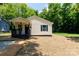 Charming, newly renovated, single-story home with a welcoming front porch and fresh landscaping at 426 Williamson St, Rock Hill, SC 29730