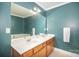Spacious bathroom features double sinks and a large mirror at 4732 Meadowfield Rd # L35, Charlotte, NC 28215