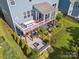 Aerial shot of the home with deck, patio, fire pit, and screened in porch at 500 Landau Rd, Waxhaw, NC 28173