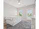 Bedroom featuring neutral walls, carpet floors, ceiling fan, and natural light at 500 Landau Rd, Waxhaw, NC 28173