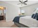 Spacious bedroom features a ceiling fan, neutral walls, and an attached bathroom at 500 Landau Rd, Waxhaw, NC 28173