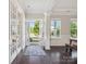 Bright foyer with hardwood floors, white trim, and an open view of the outdoors at 500 Landau Rd, Waxhaw, NC 28173