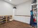 Spacious craft room featuring wooden floors, neutral walls, and white storage at 500 Landau Rd, Waxhaw, NC 28173