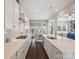 Open-concept kitchen with stainless steel appliances, modern finishes, and a view into a dining area at 500 Landau Rd, Waxhaw, NC 28173