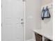 Entryway featuring a bench, coat hooks, and storage baskets at 500 Landau Rd, Waxhaw, NC 28173