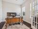 Office space with a large wood desk, dual monitors, and French doors at 500 Landau Rd, Waxhaw, NC 28173