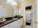 Clean bathroom features a vanity with granite countertop, framed mirror and recessed lighting at 5572 Yorke Nw St, Concord, NC 28027