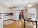 Bright eat-in kitchen with updated appliances and adjoining dining area, perfect for Gathering meals at 5572 Yorke Nw St, Concord, NC 28027