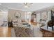 Spacious living room with hardwood flooring, neutral-toned walls, and natural light at 5572 Yorke Nw St, Concord, NC 28027