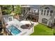 This backyard boasts a pool, deck, and screened-in porch with plenty of space for outdoor entertaining at 6800 Augustine Way, Charlotte, NC 28270