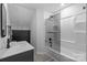 Modern bathroom featuring a shower with glass door, vanity and modern fixtures at 6800 Augustine Way, Charlotte, NC 28270