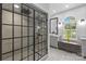 Modern bathroom featuring a glass enclosed shower, granite vanity, and contemporary finishes at 6800 Augustine Way, Charlotte, NC 28270