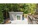 Exterior of a pool house located near the outdoor seating deck at 6800 Augustine Way, Charlotte, NC 28270