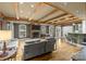 Open living room featuring a fireplace, dining area, and seating at 6800 Augustine Way, Charlotte, NC 28270