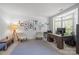Bright home office with natural light, neutral carpet and modern desk and chair at 6800 Augustine Way, Charlotte, NC 28270
