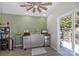 Pool house with a kitchenette and sliding doors leading to the deck area at 6800 Augustine Way, Charlotte, NC 28270