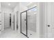 Bright bathroom features a glass shower and tile flooring at 7025 Amberhouse Dr, Charlotte, NC 28212