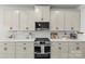 Modern kitchen featuring stainless steel appliances, sleek countertops, and ample cabinet storage at 7025 Amberhouse Dr, Charlotte, NC 28212