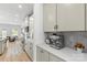 Updated kitchen features a custom coffee bar, modern appliances, and an open concept design at 7025 Amberhouse Dr, Charlotte, NC 28212