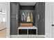 The mudroom features a built-in bench and storage cubbies, perfect for organization at 7025 Amberhouse Dr, Charlotte, NC 28212