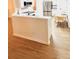 Bright kitchen featuring white cabinets, stainless appliances, and eat-in nook at 7215 Wingstone Ln, Charlotte, NC 28262