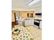 Bright kitchen featuring white cabinets, stainless appliances, and an open layout at 7215 Wingstone Ln, Charlotte, NC 28262