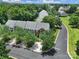 An aerial view of a well-maintained neighborhood with lush green trees and neatly arranged townhomes at 918 Kite Dr, Fort Mill, SC 29715