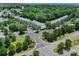 A stunning aerial view highlighting a meticulously landscaped community with winding roads and serene surroundings at 918 Kite Dr, Fort Mill, SC 29715