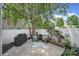 An intimate back patio offering comfortable seating with decorative cushions and a grill at 918 Kite Dr, Fort Mill, SC 29715