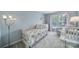 A cozy bedroom with a daybed and ample natural light from the large window at 918 Kite Dr, Fort Mill, SC 29715