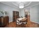 Stylish dining area with wood floors, designer lighting, and ample natural light at 918 Kite Dr, Fort Mill, SC 29715