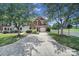 A charming brick home with an attached garage, lovely landscaping, and a welcoming entrance at 918 Kite Dr, Fort Mill, SC 29715