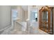 Upstairs hallway with views to bedrooms and an ornate wood hutch at 918 Kite Dr, Fort Mill, SC 29715