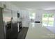 Well-lit kitchen with stainless steel appliances and sleek countertops at 9208 Detroiter Dr, Huntersville, NC 28078