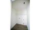 Well-lit laundry room with essential hookups, perfect for seamless chores at 9208 Detroiter Dr, Huntersville, NC 28078