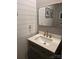 Stylish bathroom with updated vanity, white counters, and shiplap walls at 1224 Dali Blvd, Mount Holly, NC 28120