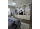 Spacious main bedroom with custom built-ins, hardwood floors, and stylish decor at 1224 Dali Blvd, Mount Holly, NC 28120