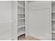 Large walk-in closet with shelving at 12325 Woodside Falls Rd, Pineville, NC 28134