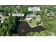 Aerial view of Woodside Community Park with a pool, playground, and tennis court at 12325 Woodside Falls Rd, Pineville, NC 28134