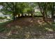 Two-story home on a lovely lot surrounded by mature trees at 12325 Woodside Falls Rd, Pineville, NC 28134