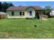 View of a well-maintained single-Gathering home with a lush green lawn and inviting entrance at 1242 Mitchell Ave, Statesville, NC 28677