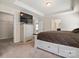 Main bedroom featuring an ensuite bathroom, walk-in closet and tray ceilings at 12704 Franklin Square Rd, Charlotte, NC 28213