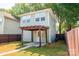 Backyard view featuring a home with a covered patio, offering an ideal outdoor living space at 13115 Meadowmere Rd, Huntersville, NC 28078