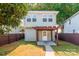 Backyard view featuring a home with a covered patio, offering an ideal outdoor living space at 13115 Meadowmere Rd, Huntersville, NC 28078