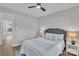 Cozy bedroom with soft lighting, neutral tones, and decorative pillows at 13115 Meadowmere Rd, Huntersville, NC 28078