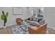 Comfortable living room featuring contemporary furnishings and hardwood floors at 13115 Meadowmere Rd, Huntersville, NC 28078