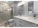 Modern bathroom featuring a glass-enclosed shower and double vanity with elegant fixtures at 1326 Anthem Ct, Charlotte, NC 28205