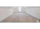 A finished attic provides a versatile space for storage or recreational activities at 139 Sheep Path Dr, Mooresville, NC 28115